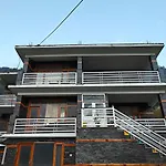 Santosh Cafe & Rooms